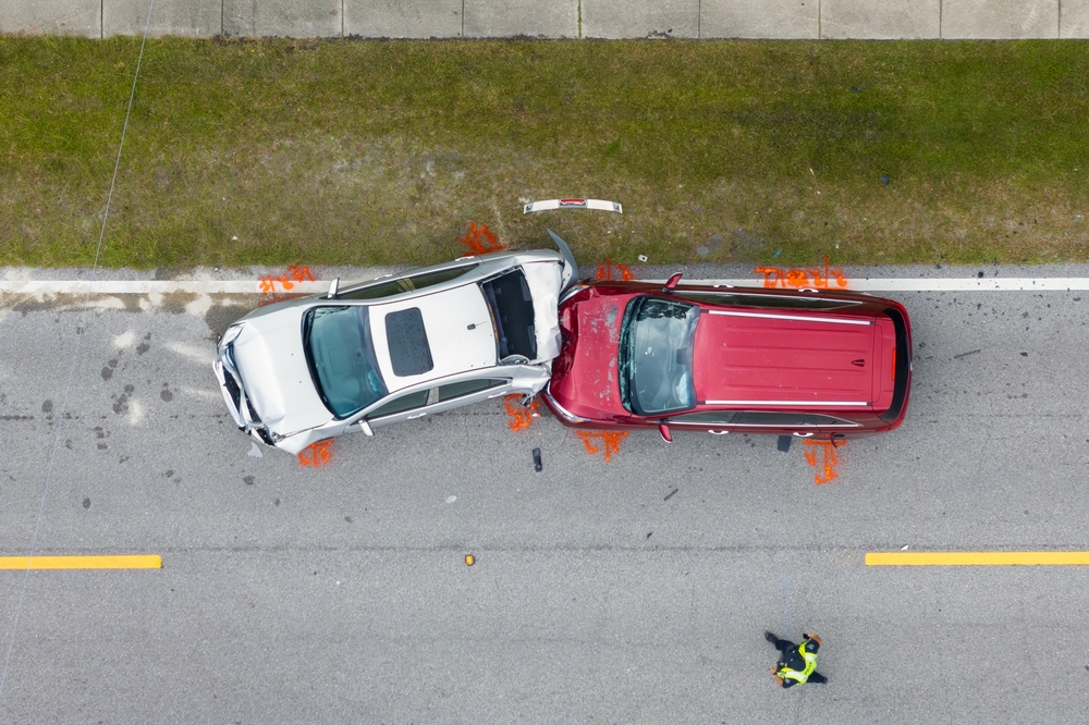 Car,Crash,With,Two,Vehicles,Collided,At,Traffic,Accident,Site
